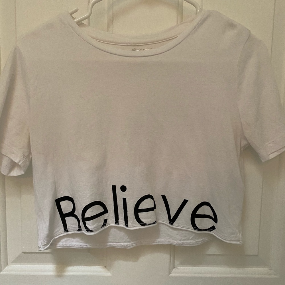 White Forever 21 cropped “believe” shirt.